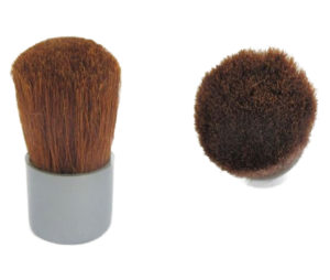 This ultra-soft, synthetic hair Mini Kabuki Brush provides medium to full coverage. This is approximately: base is 7/8" wide and 2" end to end.